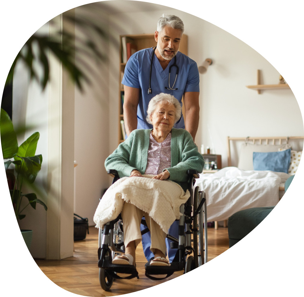 Healthcare worker assisting elderly patient