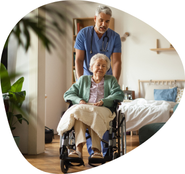 Healthcare worker assisting elderly patient